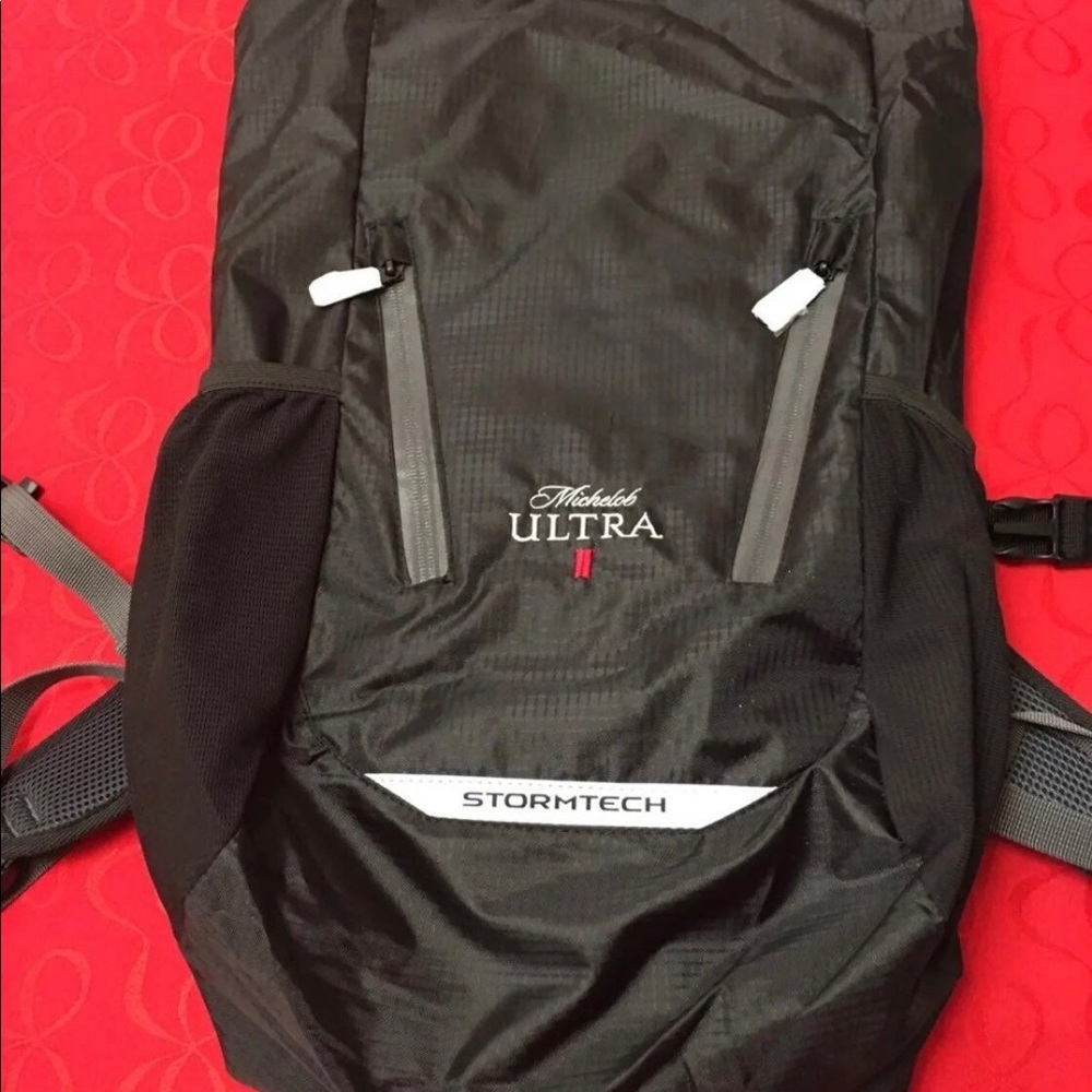 New with tag Stormtech backpack lots of compartments - Picture 3 of 16